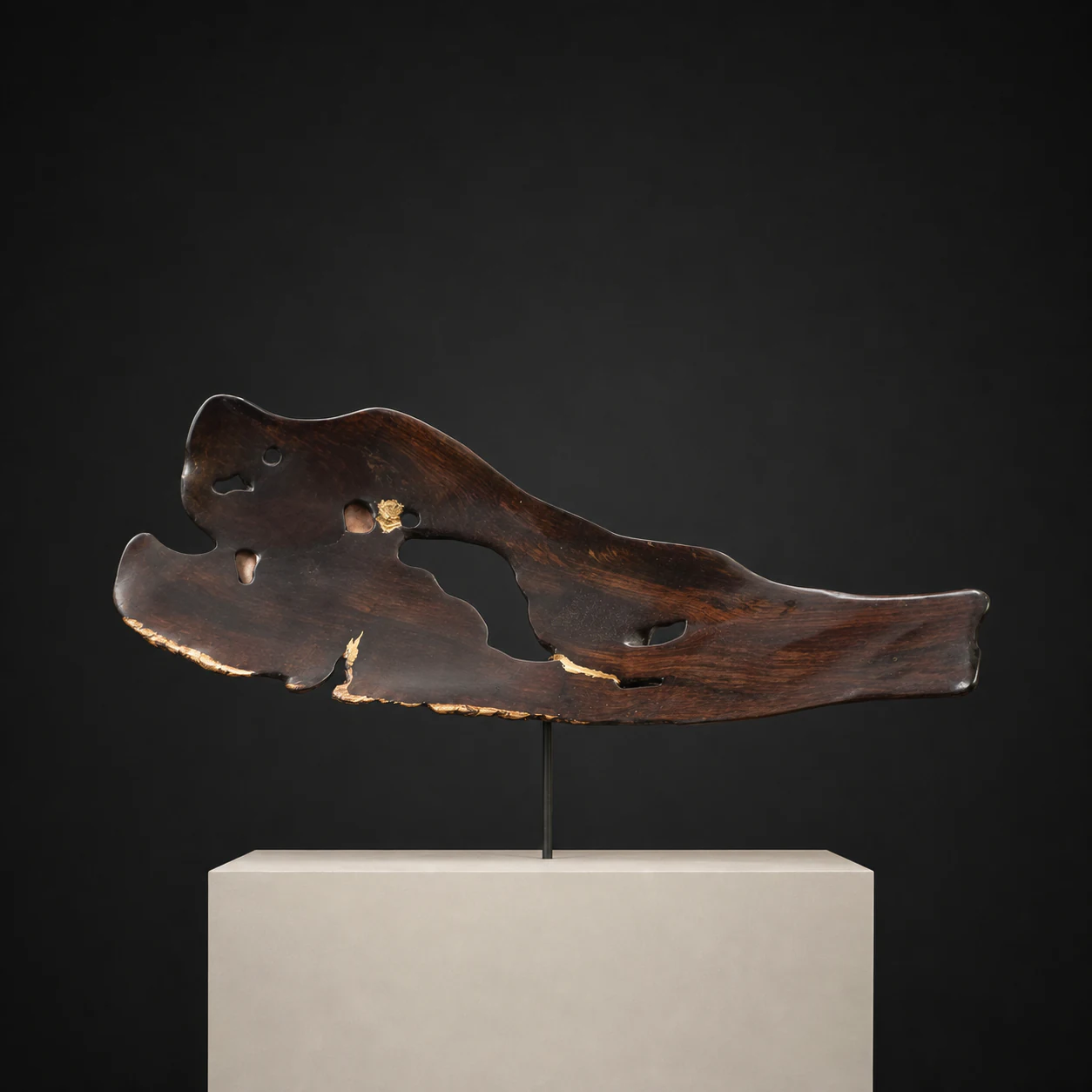 Arizona Desert Wood Platter, a one-of-one Arizona Desert Wood sculpture by Rodney Band, centred on a warm limestone plinth against a charcoal studio ground.